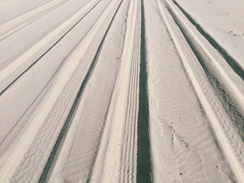 Tire tracks on beach