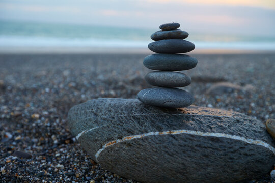 stone stack on the beach - Powered by Adobe