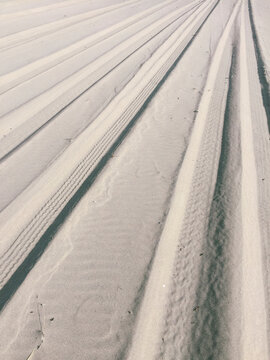 Tire tracks on beach