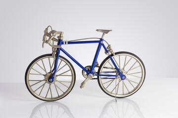 Fototapeta na wymiar blue toy road bike isolated on white background