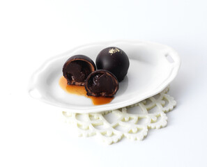 Wine-filled chocolate on a plate