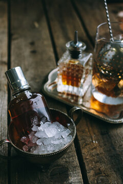 classic manhattan cocktail ingredients on wooden background from above
