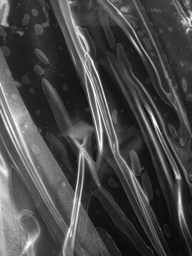 Close up of winkles and folds of industrial plastic covering