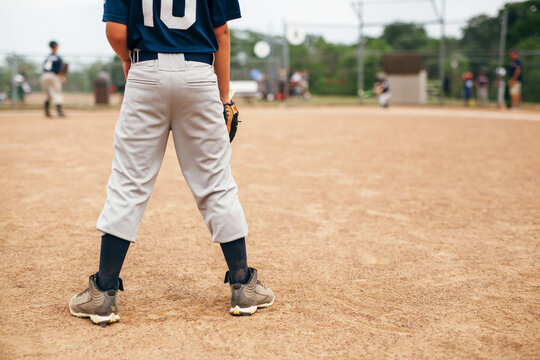 Behind The Shortstop During A Baseball Game