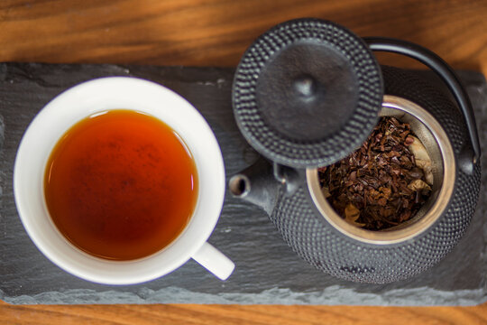 Japanese tea in a cup with teapot