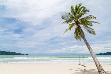 Exotic Tropical Paradise Swings over Crystal Clear Turquoise Blue Ocean Sea.