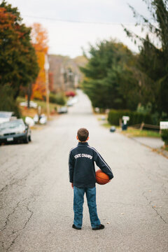 Young Basketball Player playing in Street