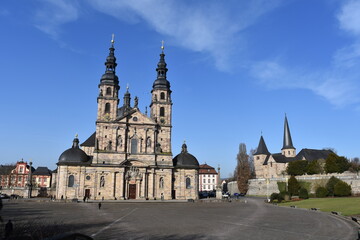 Fototapeta na wymiar Fulda Dom and Michaelskirche, Fulda Dom Platz, cathedral, Germany, Fulda, Old, travel, sightseeing, achitecture, church, blue sky, clouds, town square, stone buildings