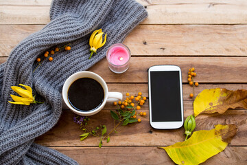 mobile phone ,hot coffee espresso , knitting wool scarf and yellow flower ylang ylang ,yellow...