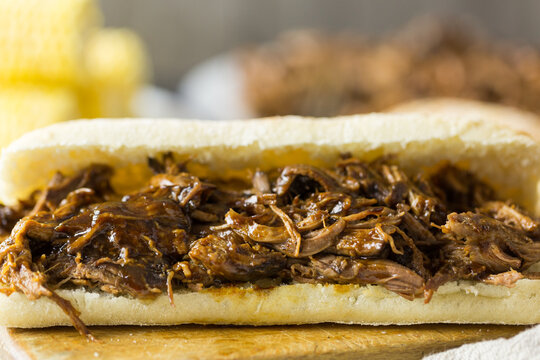 Shredded Pulled Beef In A Panini Bread Roll Sandwich