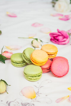 macarons in spring colours with roses