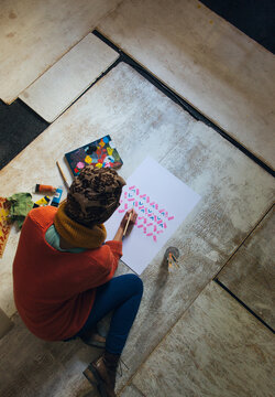 Artist Studio - Female Painter Working on White Shabby Chipboards