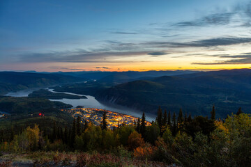 Panoramic View of Dawson City Lights from above at Night. Aerial Drone Shot. Taken from Midnight...