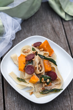 pappardelle with roasted pumpkin, burnt butter with sage, topped with pine nuts