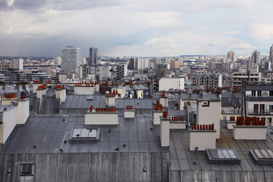 Looking Over The Rooftops Of Paris France On A Cloudy Day