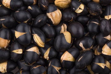 A close up image of heap black beans.