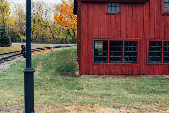 Old cider mill next to a railway