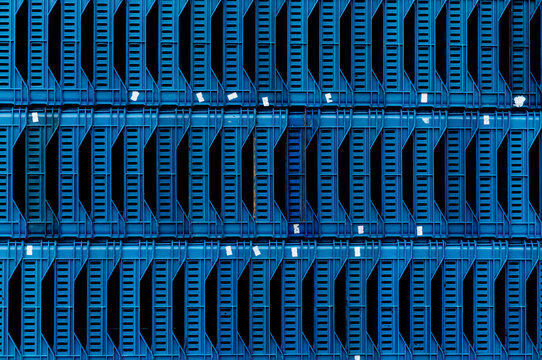 Tightly packed empty plastic crates