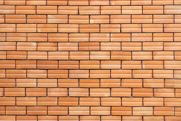 Orange Brick wall layer pattern for the background. Home and office design backdrop