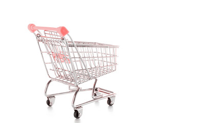 Sale banner. Food shopping basket for retail market. Empty trolley cart for supermarket isolated on white background. Sale, discount, shopaholism concept. Consumer society trend.