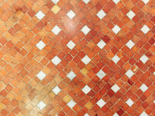 Peach color mosaic pattern on a floor