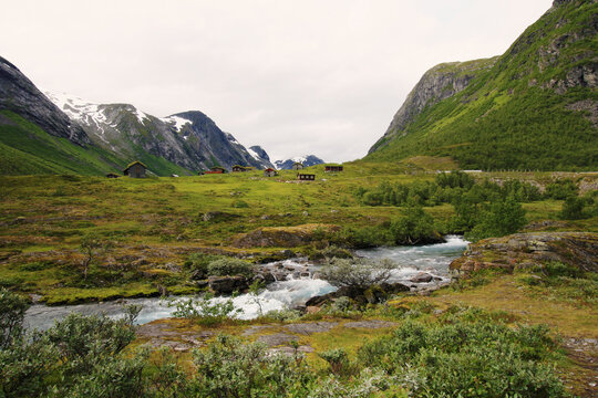 Norwegian valley landscape with hytter (cottages) in the background