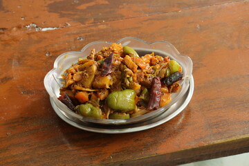 Mixed vegetables on wood background