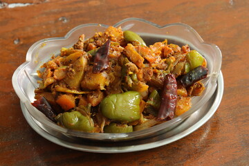 Mixed vegetables on wood background