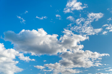 Naklejka na ściany i meble blue sky with white clouds. Close up. copy space