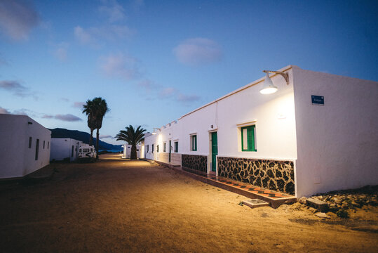 an empty mediterranean street in the evening