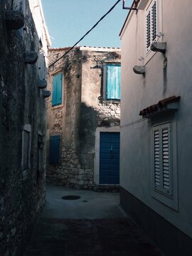 Fototapeta Street in small village near sea