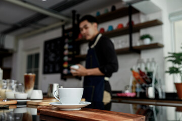 Fototapeta na wymiar Coffee mug in coffee shop cafe.