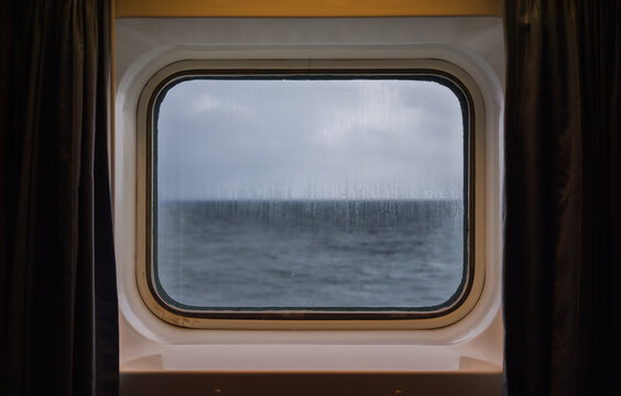 Through a steam ship window to see the sea