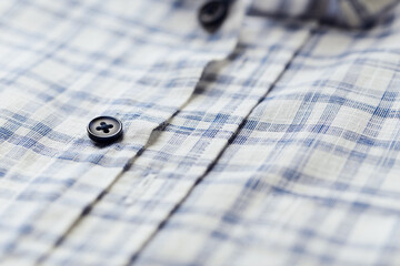 Close up of Men's checkered shirt.	