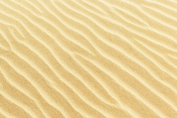 Fototapeta na wymiar Top view on sand dunes. The texture of sand