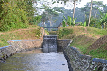 wooden bridge over the river