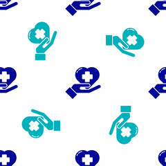 Blue Heart with a cross icon isolated seamless pattern on white background. First aid. Healthcare, medical and pharmacy sign. Vector Illustration.