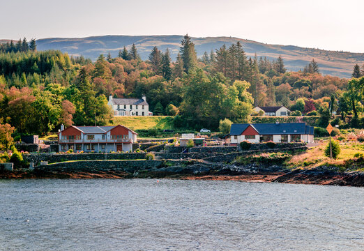 Houses facing Loch Linnhe in Corran, a former fishing village, situated on Corran Point, on the west side of the Corran Narrows of Loch Linnhe, in Lochaber, in the Scottish Highlands.