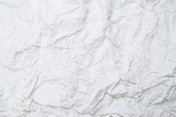 Crumpled white paper background.