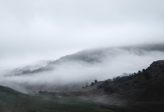 Rain clouds on the mountainside. Little Langdale, Cumbria, UK.