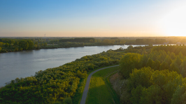 Aerial view of the Scheldt river, at sunset