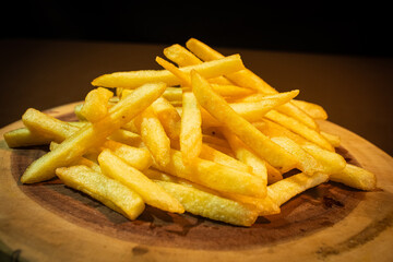 french fries wooden background