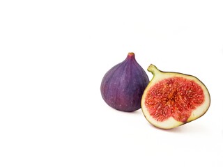 Bright juicy ripe figs on a white background.