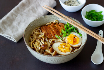 Ramen soup with noodles, pork, mushrooms and eggs. Japanese cuisine. Recipe.
