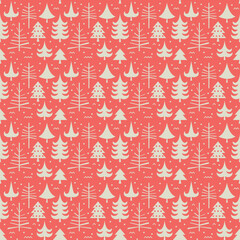 Seamless Christmas pattern with fir trees on a red background.