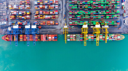 Fototapeta na wymiar Aerial top view container ship at terminal seaport, Global business cargo freight ship import export logistic and transportation by container vessel ship company worldwide.
