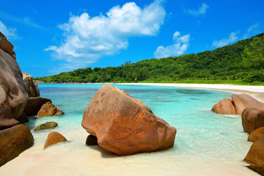 Anse Cocos beach with big granite stones in La Digue Island, Indian Ocean, Seychelles.