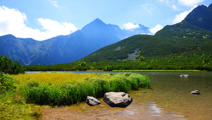 Summer mountain landscape. Lake Biele pleso in the National Park High Tatras ( Vysoke Tatry ). Slovakia, Europe.