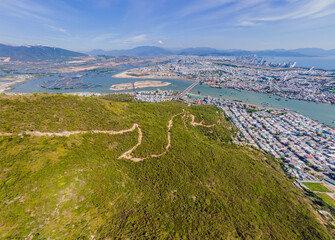 Hiking trail near the city. Aerial view from drone