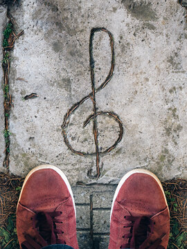 Standing in front of clef symbol